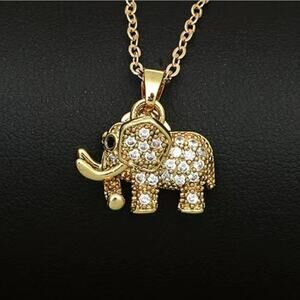 Stainless Steel Elephant Pendant Necklace in Gold Tones and embedded Zirconia